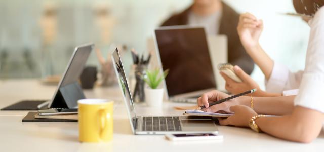 Meeting Table With Laptops